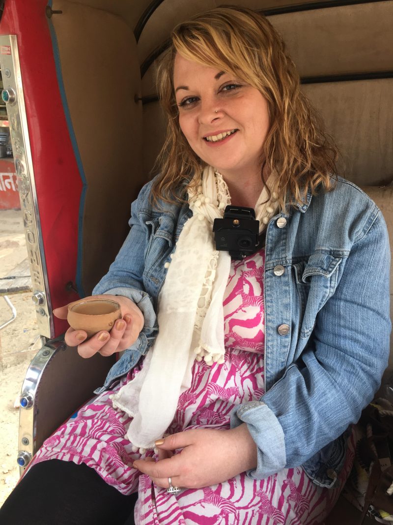 Drinking chai in a tuk tuk in India