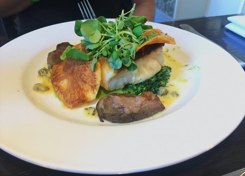 Pan-roasted cod loin, cider-braised pig cheeks, homemade crisps, pea puree and saffron tartare sauce - The Lemon Tree in Wrexham, North East Wales