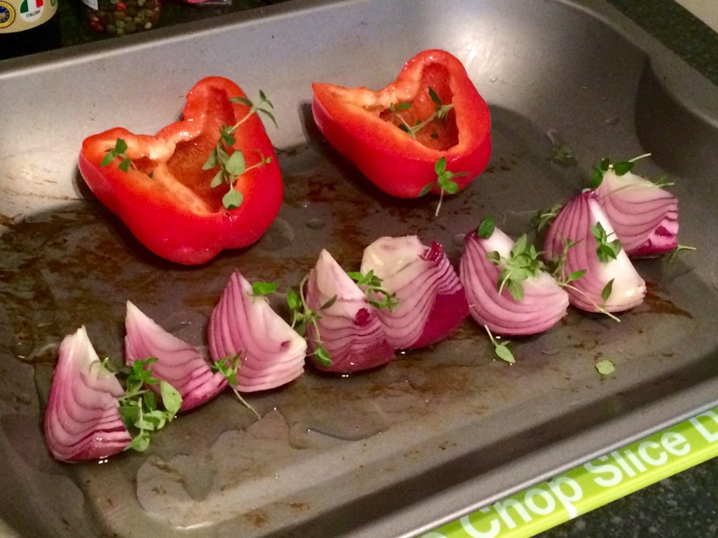 Cover the red onions and red pepper in plenty of olive oil before roasting