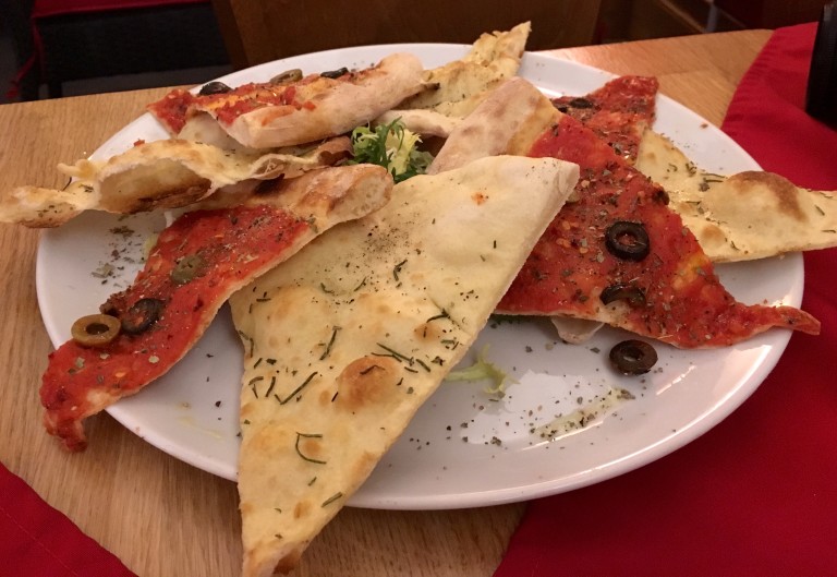 Garlic pizza bread and tomato and olive pizza bread