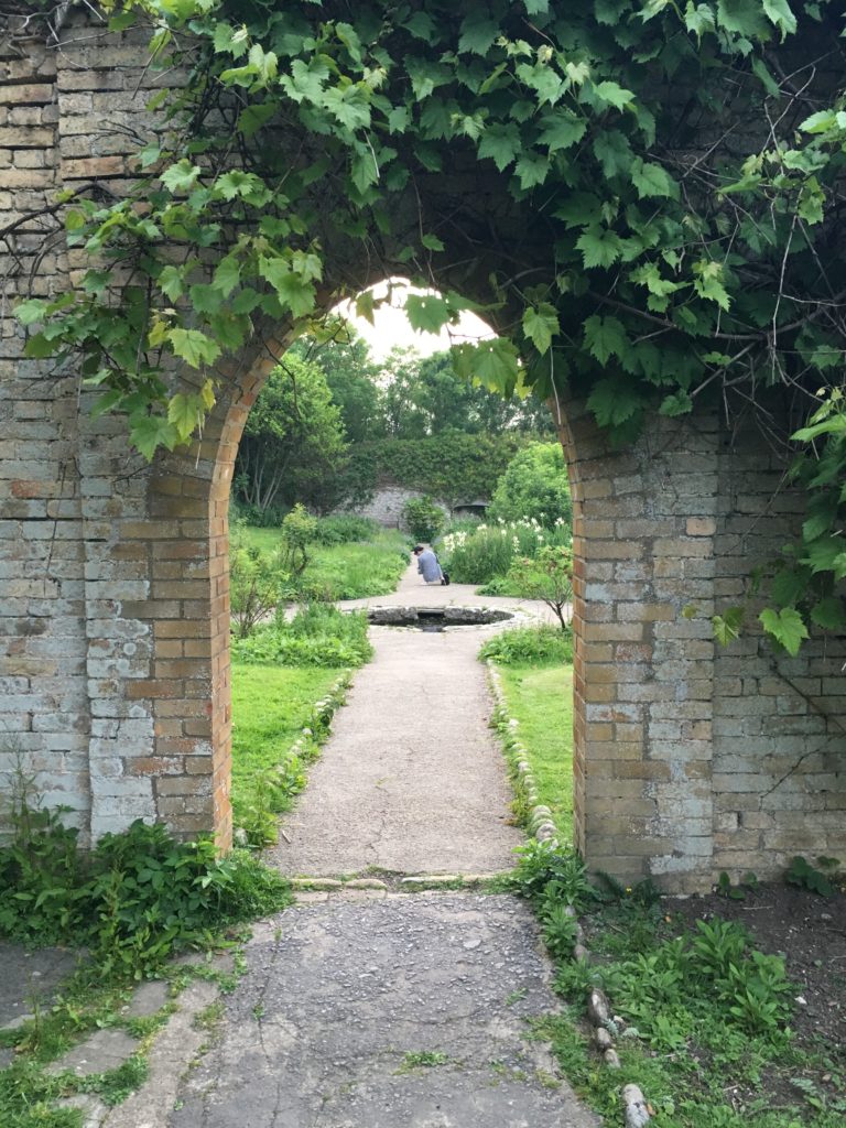 Archway in the historic walled gardens at Dunraven bay
