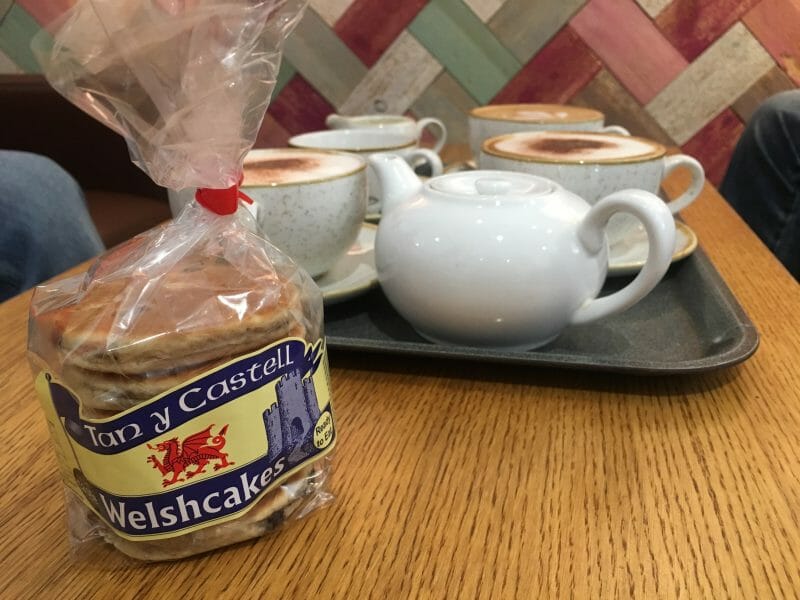 Tan-y-Castell Welshcakes and a tray holding a pot of tea and several cups of coffee