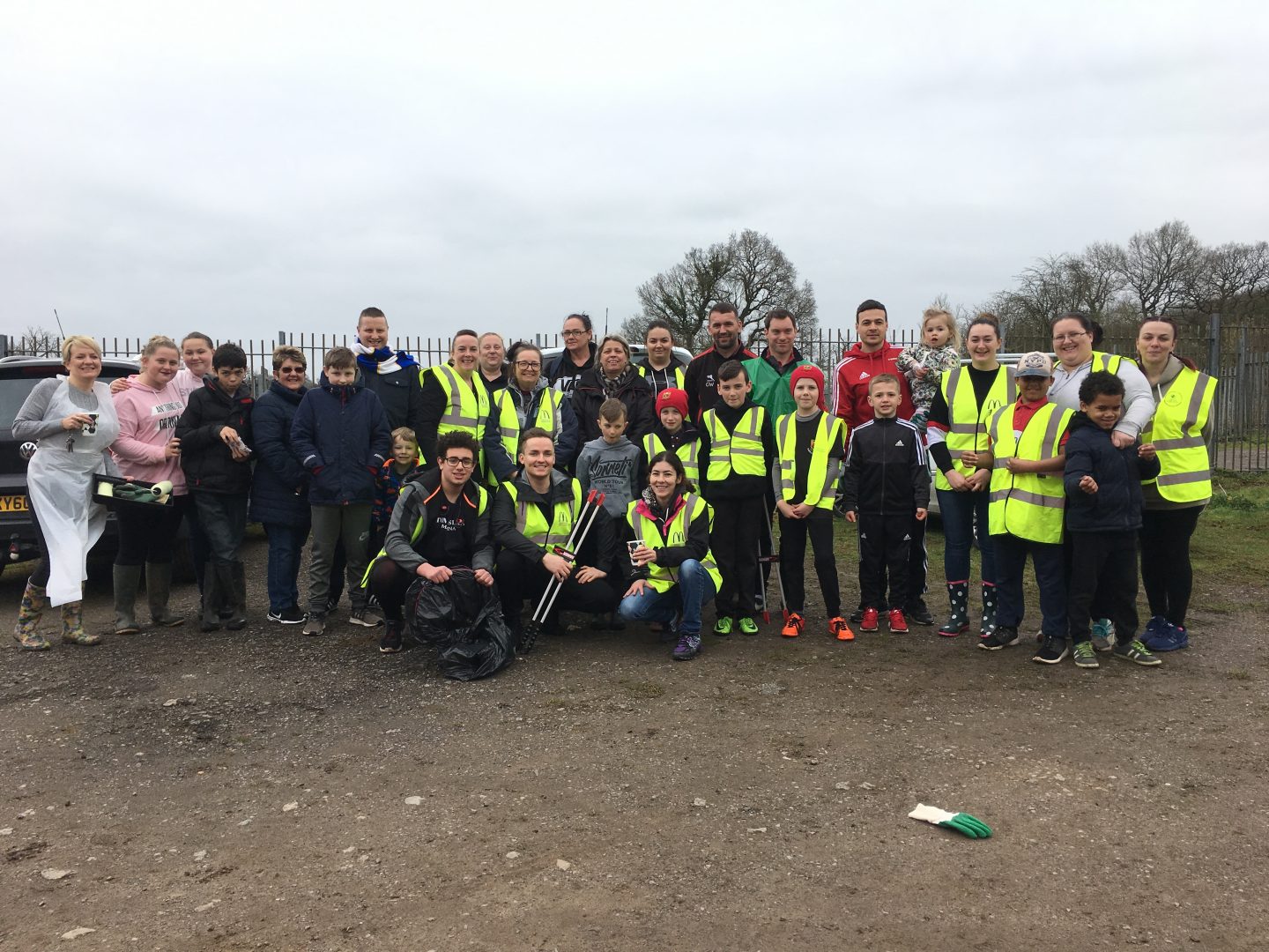 A group shot of the volunteers at the McDonald's Cardiff and Keep Wales Tidy litter pick at Caerau Ely F.C., Cardiff