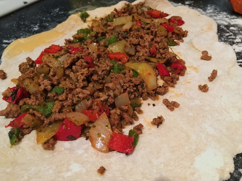 Making Turkish pizza, pide