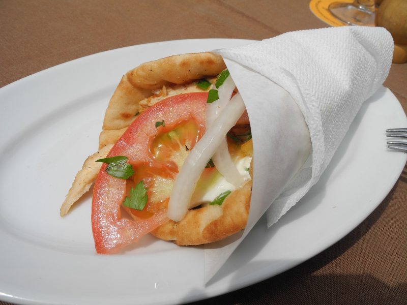 8 traditional, authentic Greek foods, including healthy dishes and vegetarian options. From meze and gyros to souvlaki and fava, there's something to suit all tastes. #greece #greekfood #meze #gyros #souvlaki #fava #foodtravel #culinarytravel