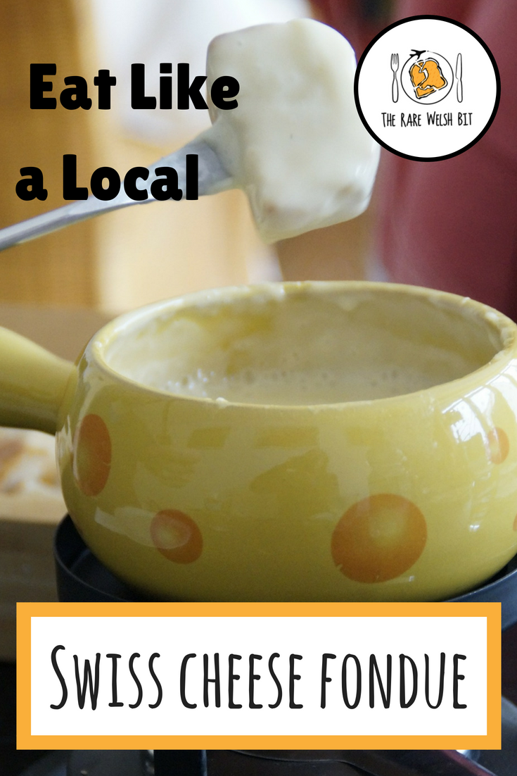 Easy Swiss cheese fondue recipe perfect for dinner parties, families and sharing with friends for occasions like Christmas Eve, Bonfire Night and birthdays. #fondue #cheesefondue #swisscheesefondue #swissfood #fonduerecipe