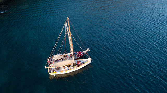 Overhead photo of two boats anchored up and tied together during a sunset cruise with Savvy Sailing, Grenada