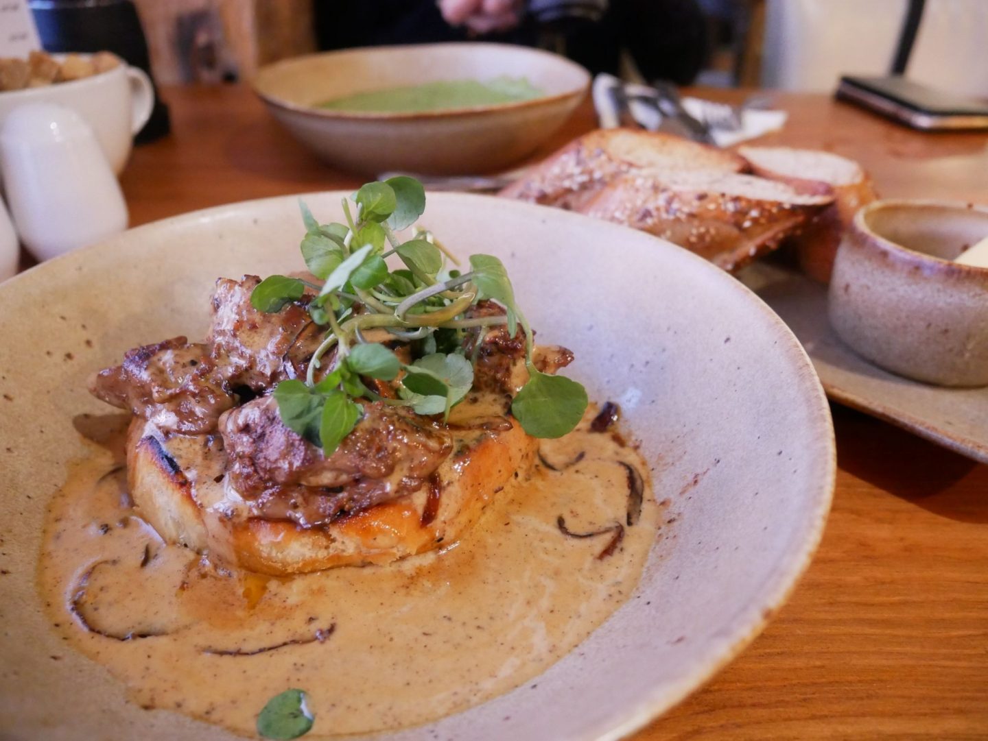 Chicken livers in creamy cherry sauce on toasted brioche