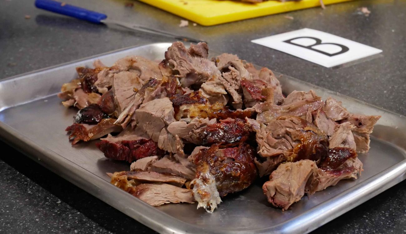 A plate of sliced roast lamb