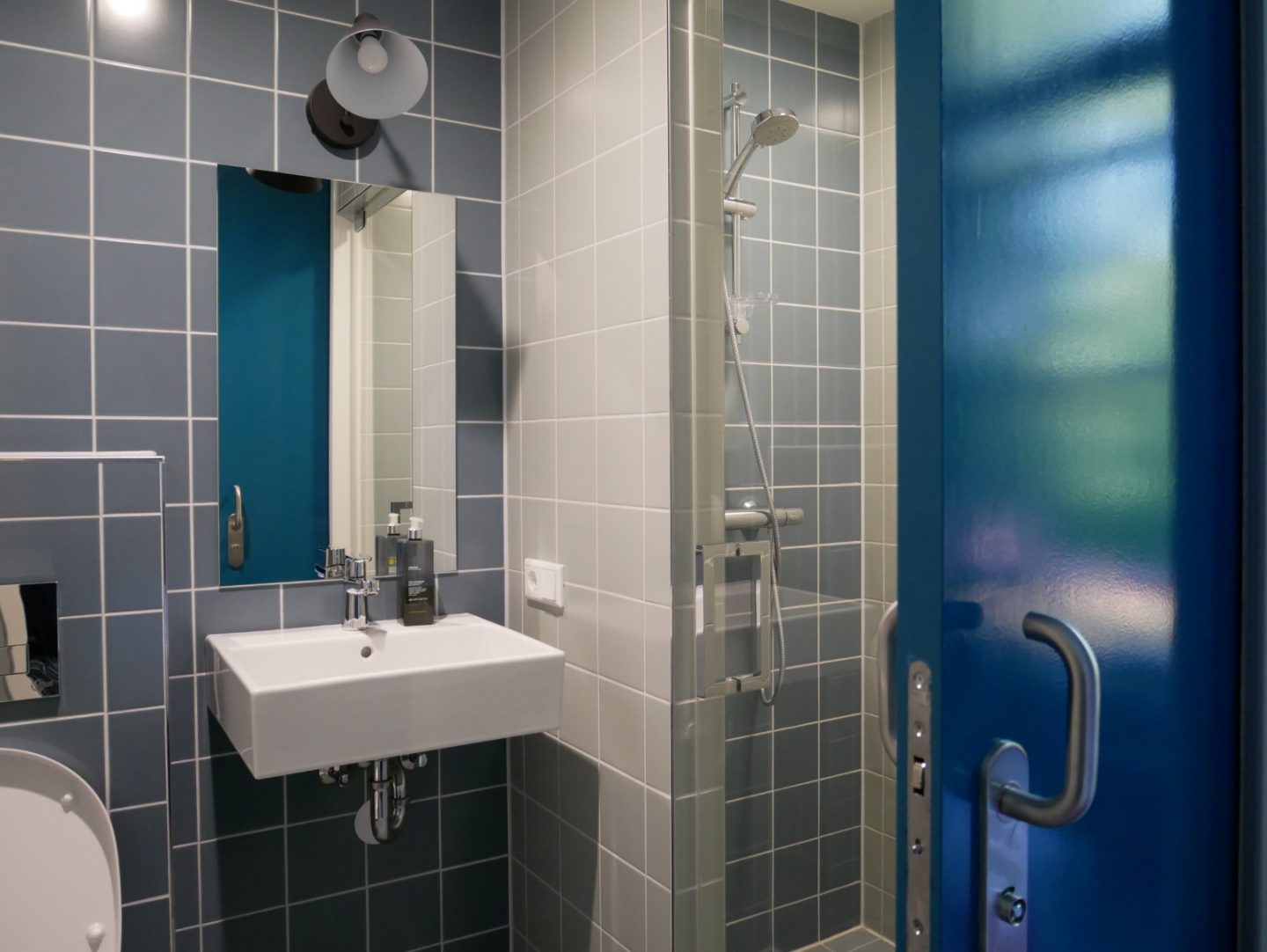 En-suite bathroom in a Comfort Room at Stayokay Amsterdam Vondelpark