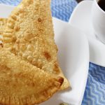 Puerto Rican Empanadas with crispy, golden bubbly batter made by Jen Ruiz of Jen on a Jet Plane blog