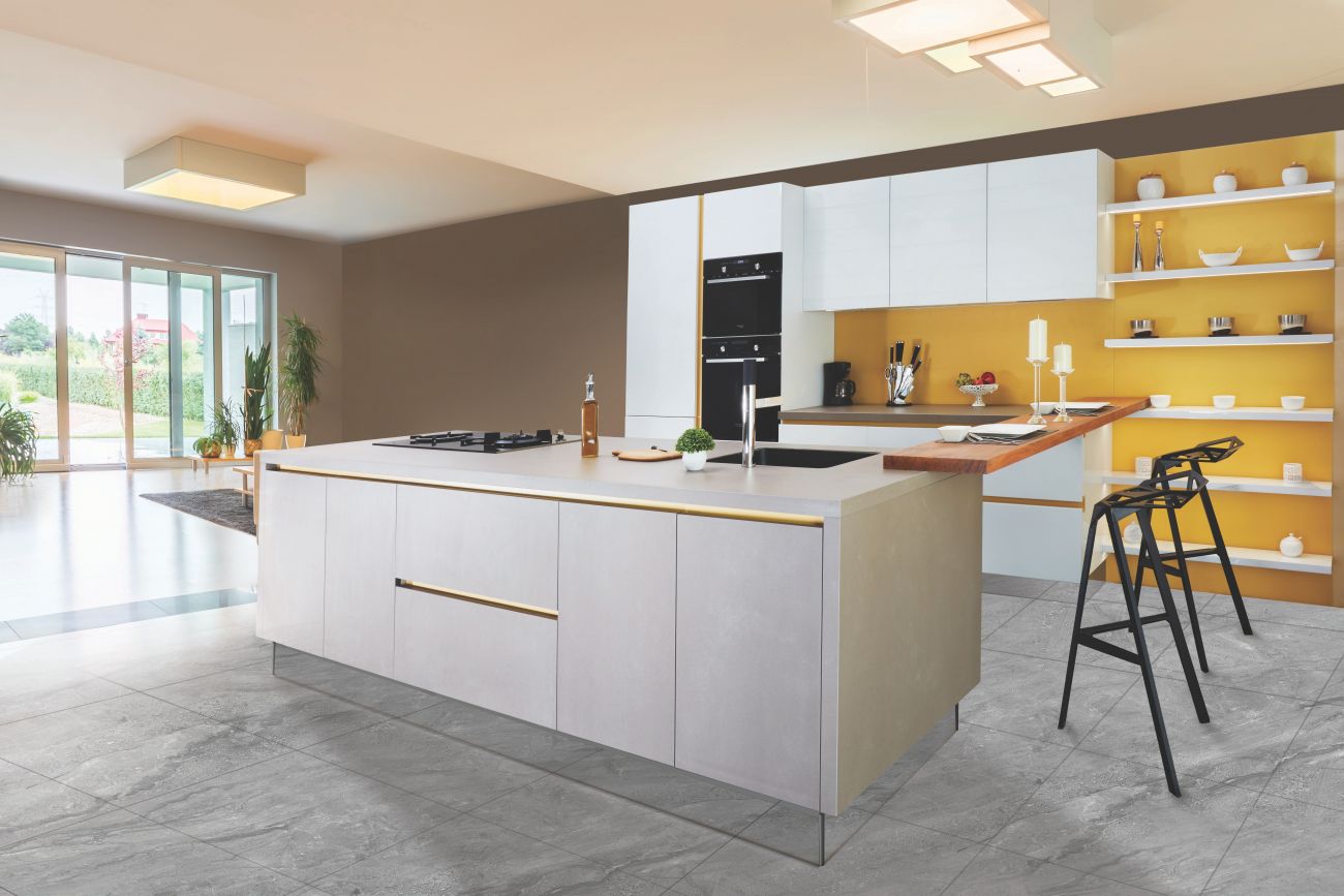 A modern kitchen with an 'island' in the centre.
