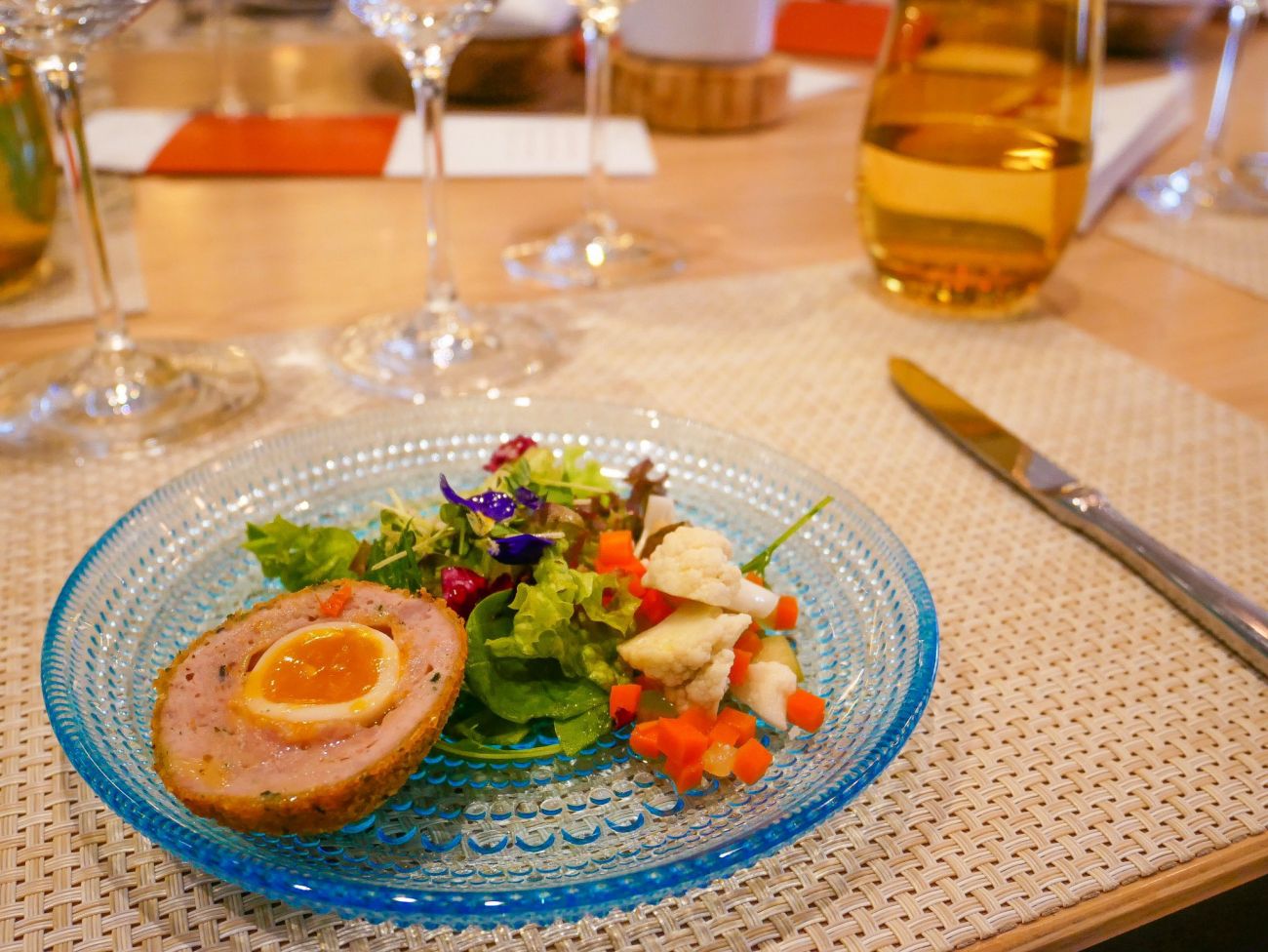Quail Scotch Egg with colourful side salad and quick pickle