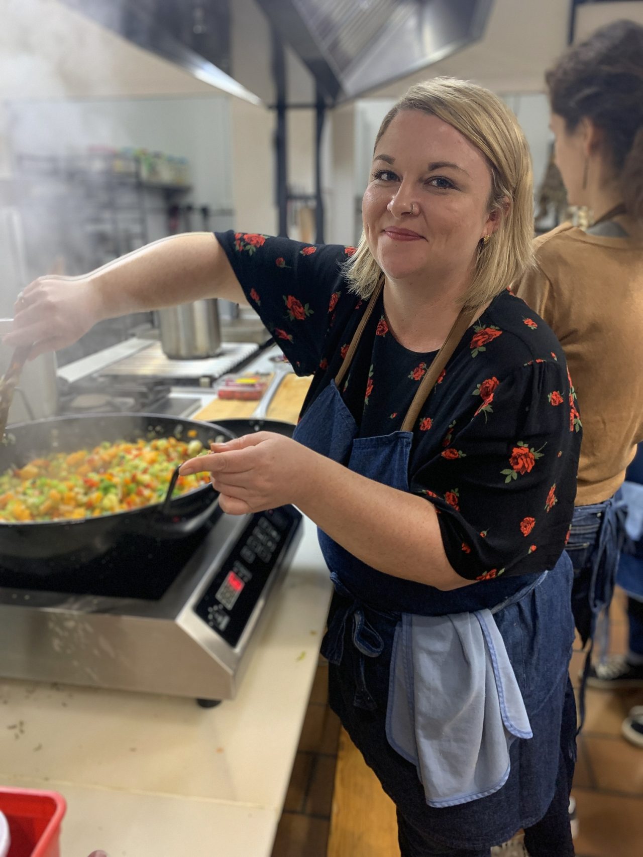 Cooking veg and chickpea stew at Elgolimbreo Cookery School in Ronda, Malaga