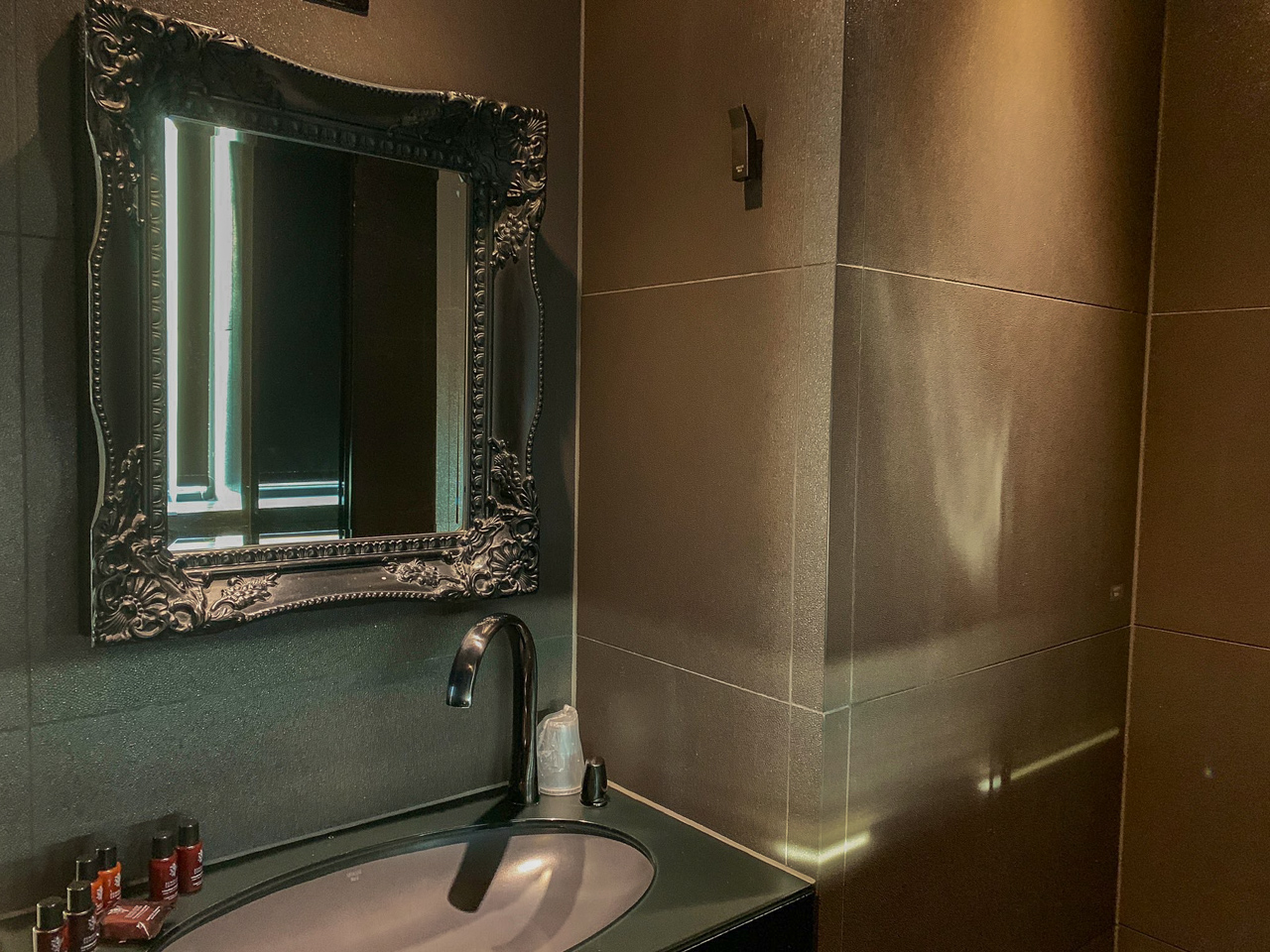 Designer bathroom with elegant mirror