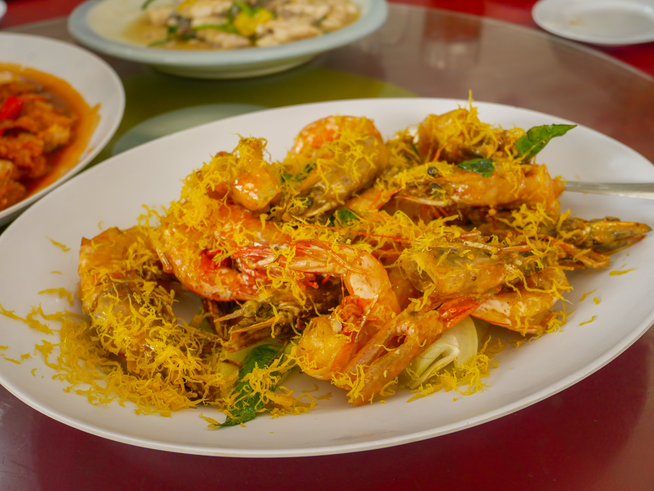 Butter prawns at Empire Seafood restaurant in Sandakan, Sabah - a top destination for nomad travel and one of the best countries to live for digital nomads.