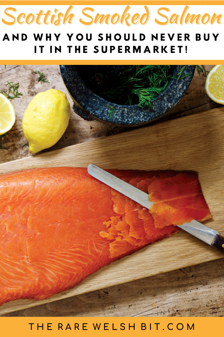Slicing Scottish smoked salmon on a chopping board