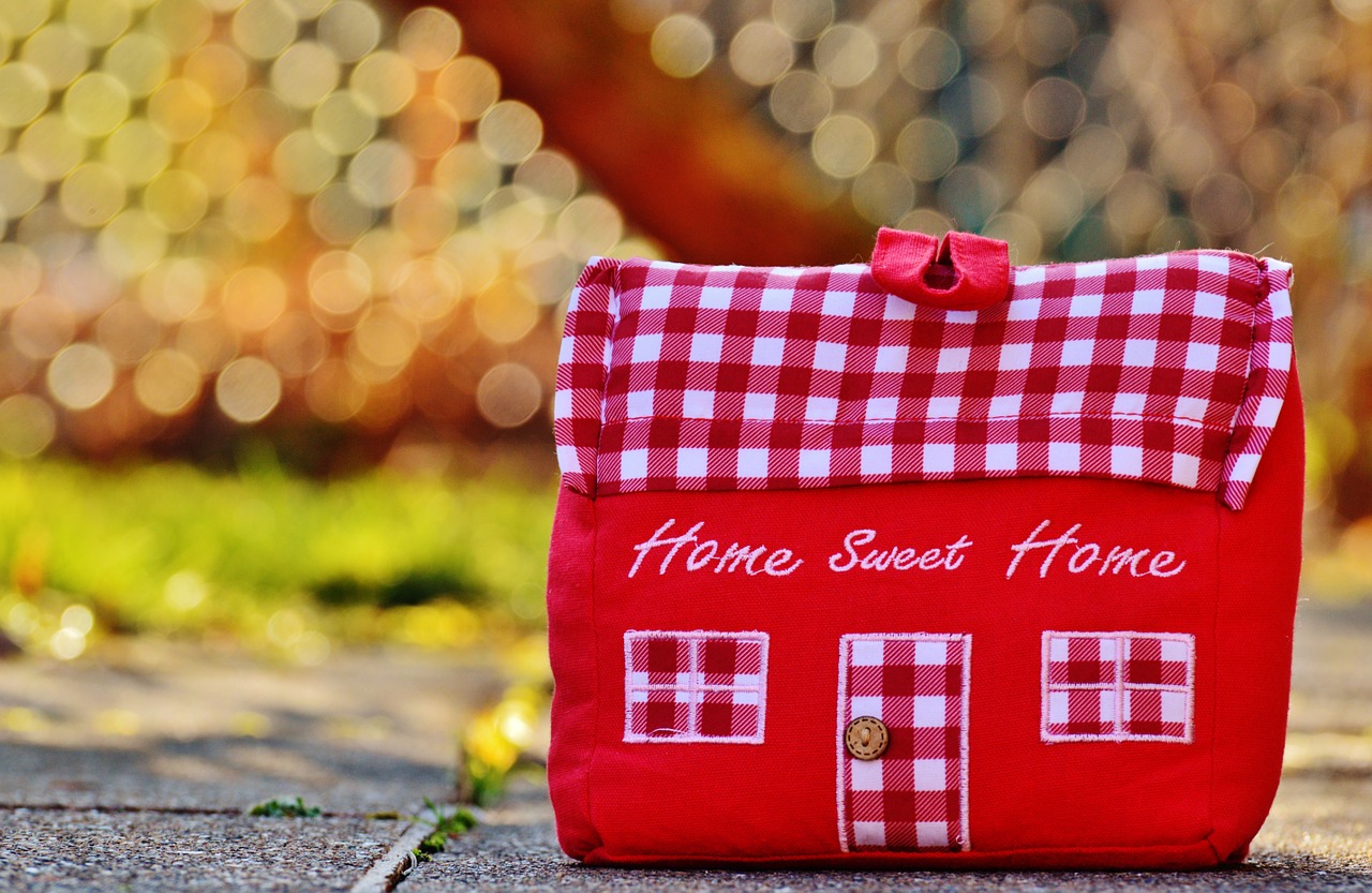 'Home Sweet Home' printed onto a soft, handmade doorstop.