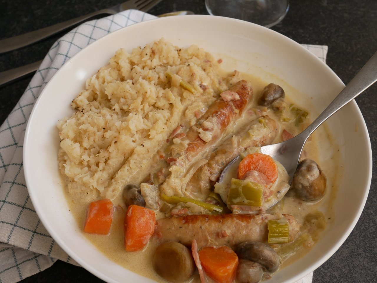 Slow cooker chicken casserole, made with chipolatas and bacon