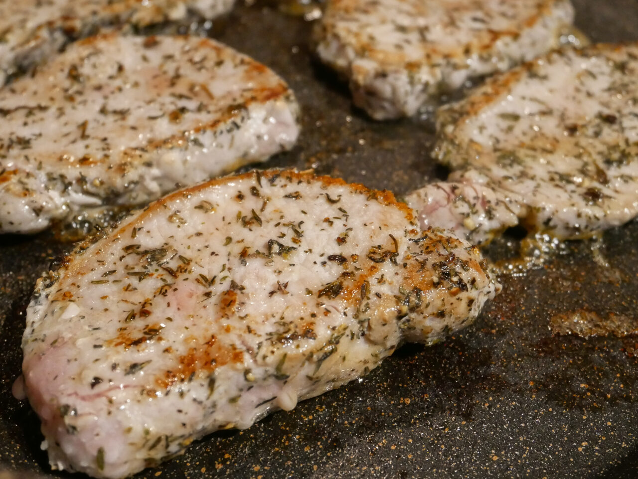Welsh pork medallions in a frying pan
