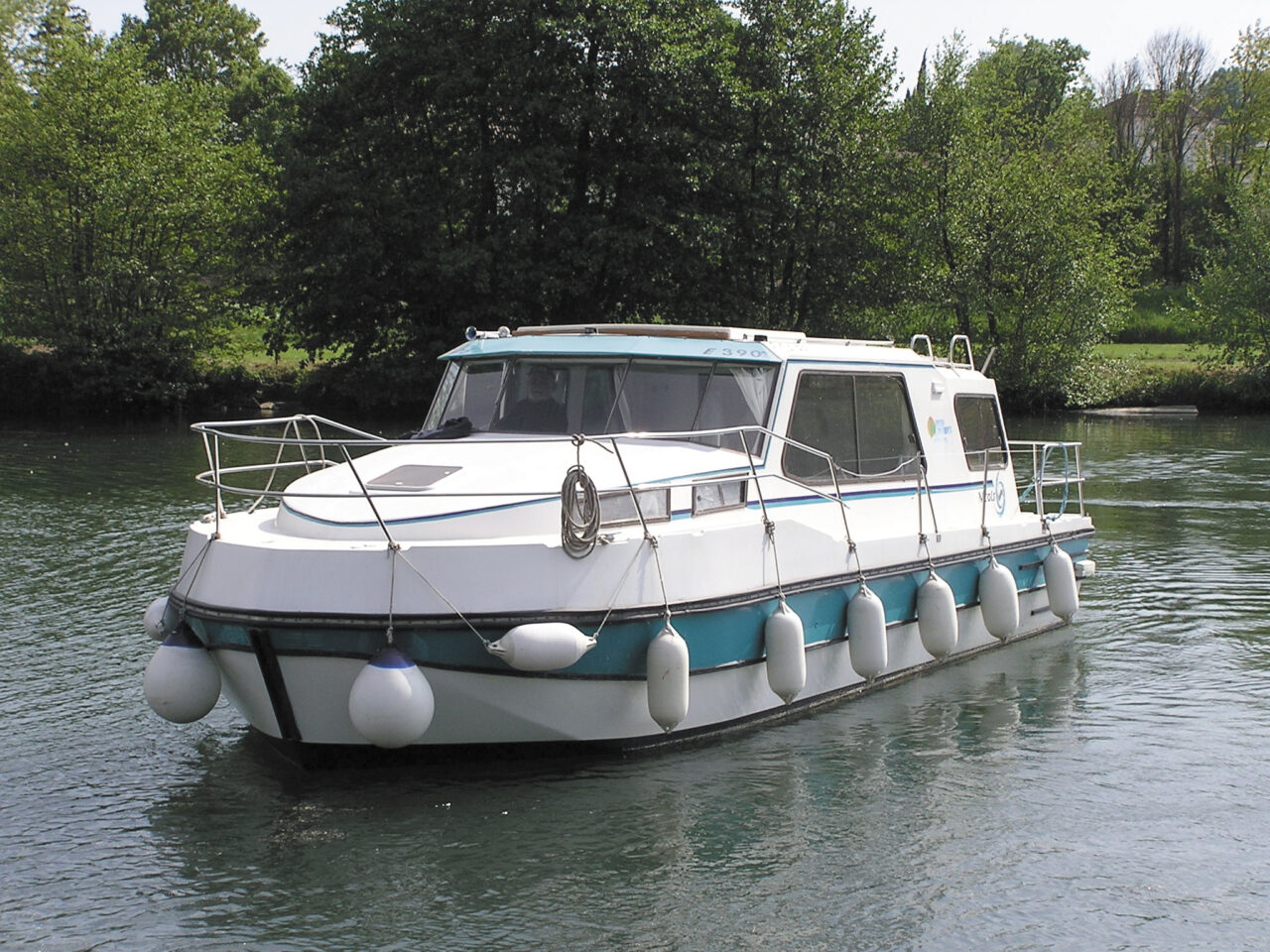 A canal boat sailing down the Riviera. Canal boat hire is expected to be popular in 2021