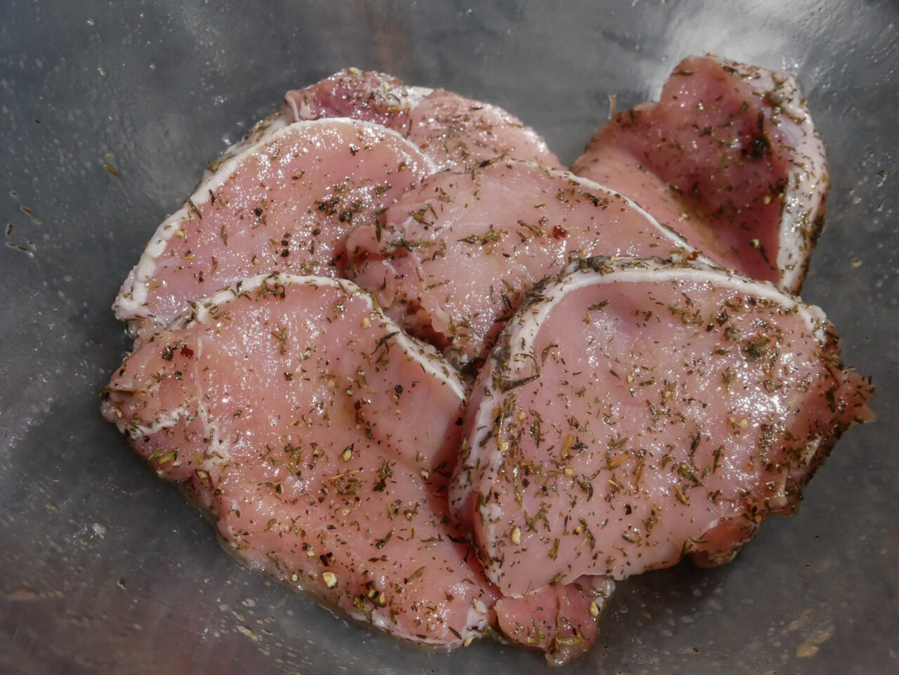Pork medallions seasoned with salt, pepper and thyme