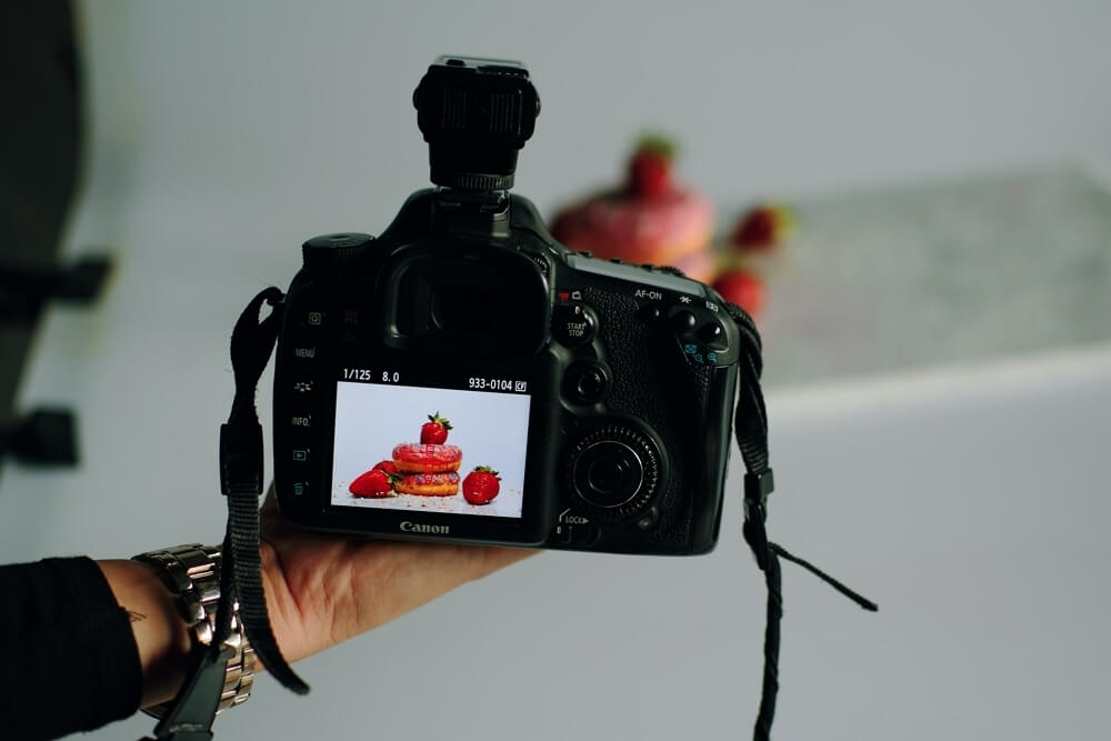 A DSLR camera with an image shown on the LCD screen.