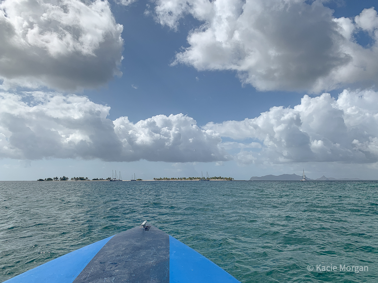 View from a tour boat sailing to Sandy Island from Paradise Beach in Carriacou, Grenada