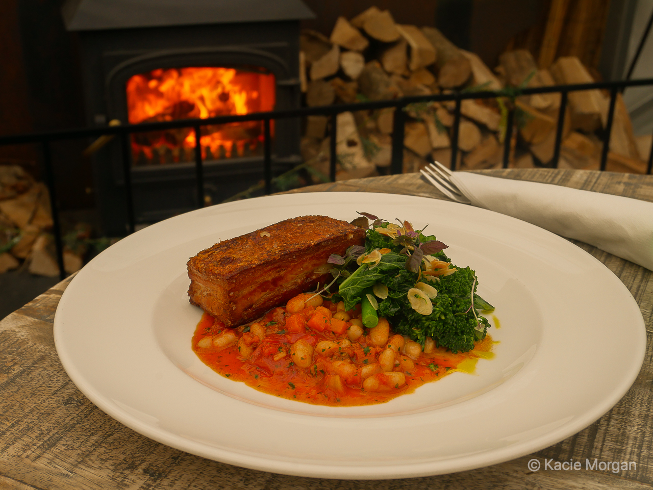 Belly pork with white beans, sobrasada, and kale,tender stem and almond salad