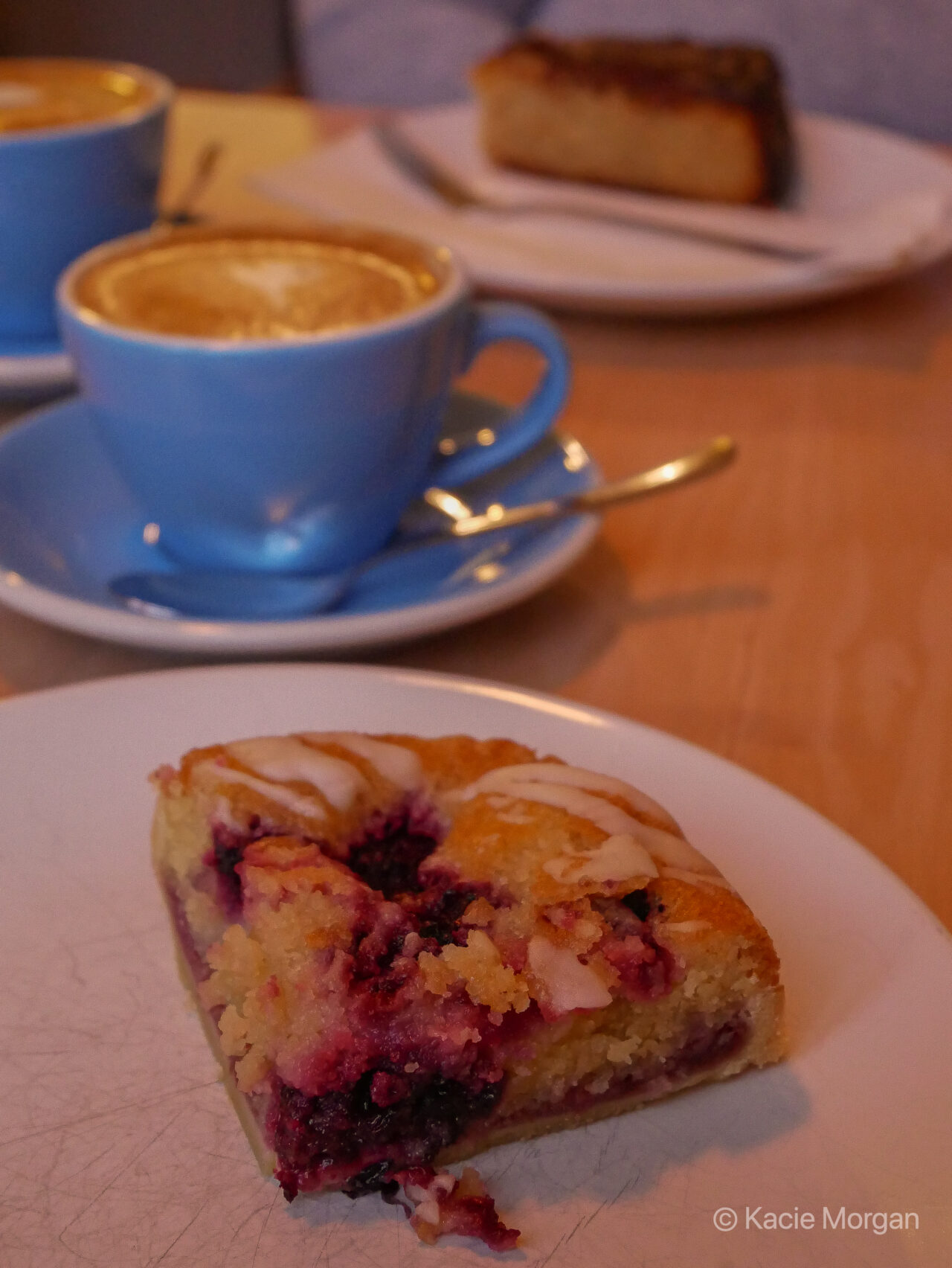 Berry bake and flat white coffee in Marches Deli, Monmouth