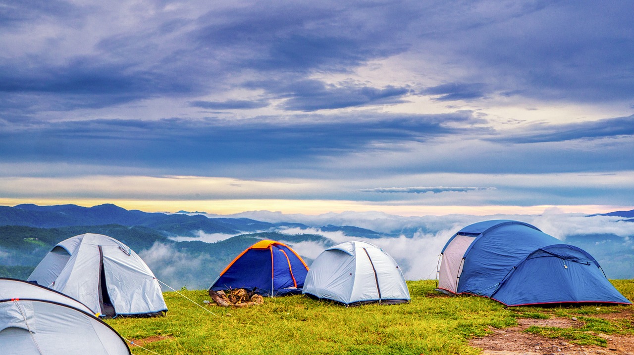 A group of tents pitched up on a mountain