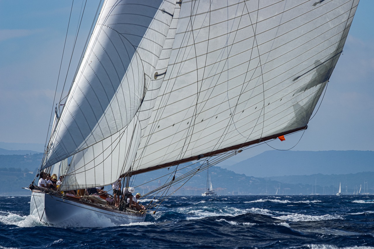 A yacht sailing through the French Riviera