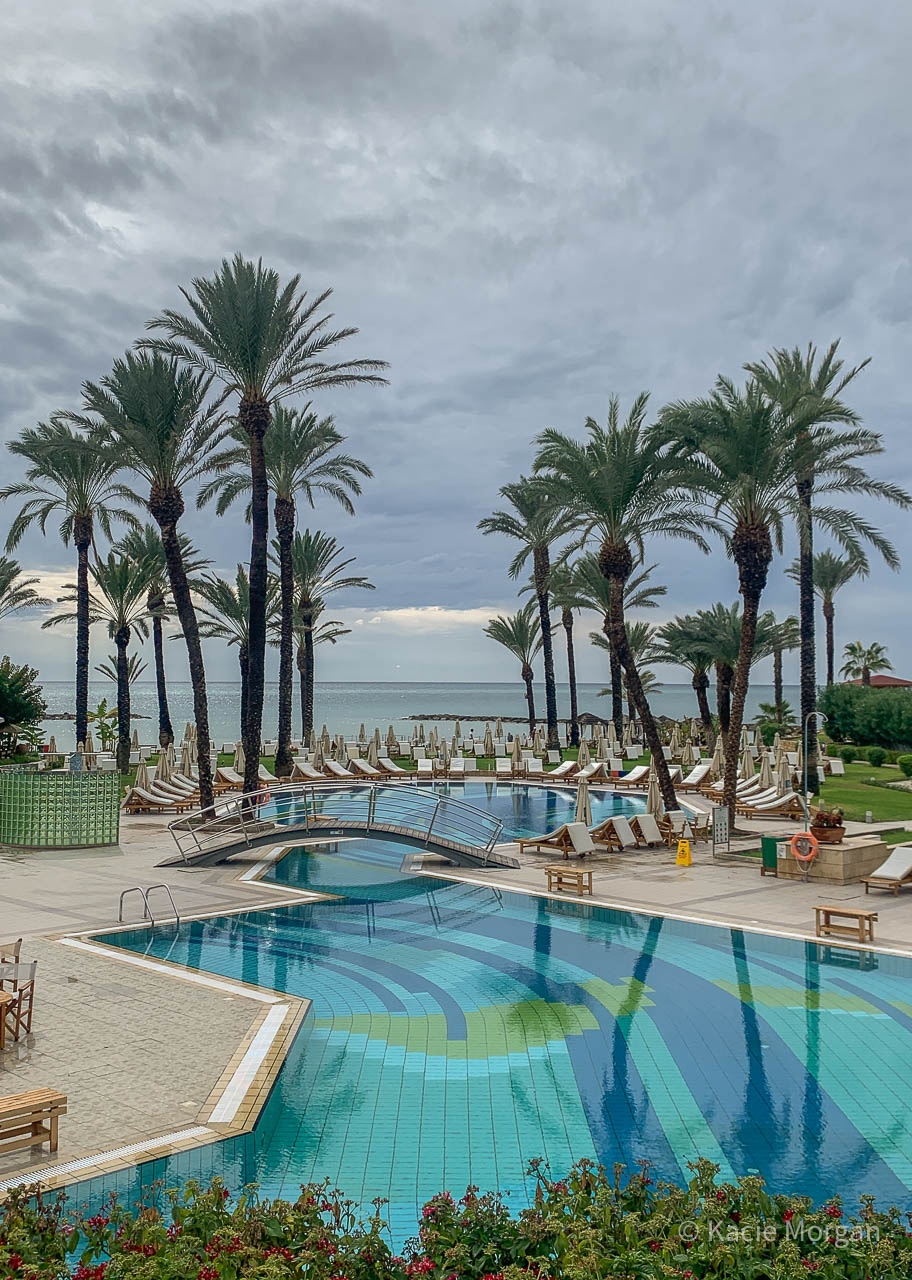 The two outdoor, interconnected swimming pools at Constantinou Bros Asimina Suites Hotel
