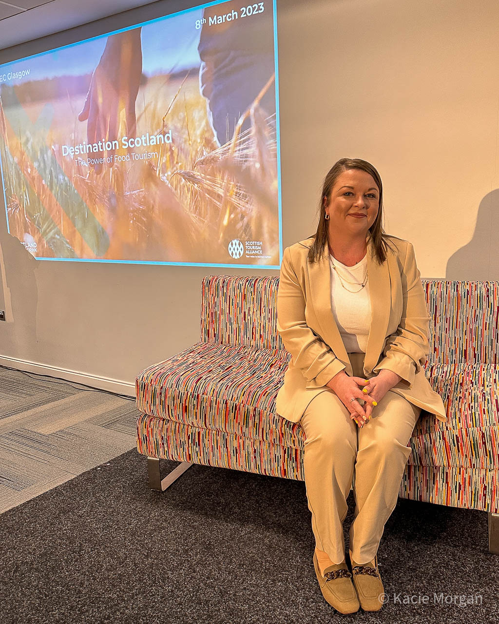 Award-winning UK food and travel blogger, Kacie Morgan speaking at the Power of Food Tourism conference in Glasgow, Scotland.