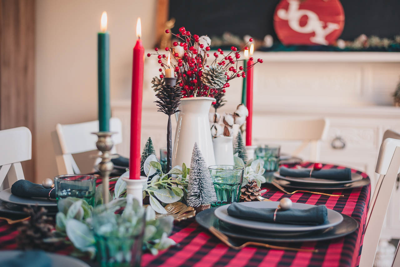 Christmas candles and a festive table arrangement