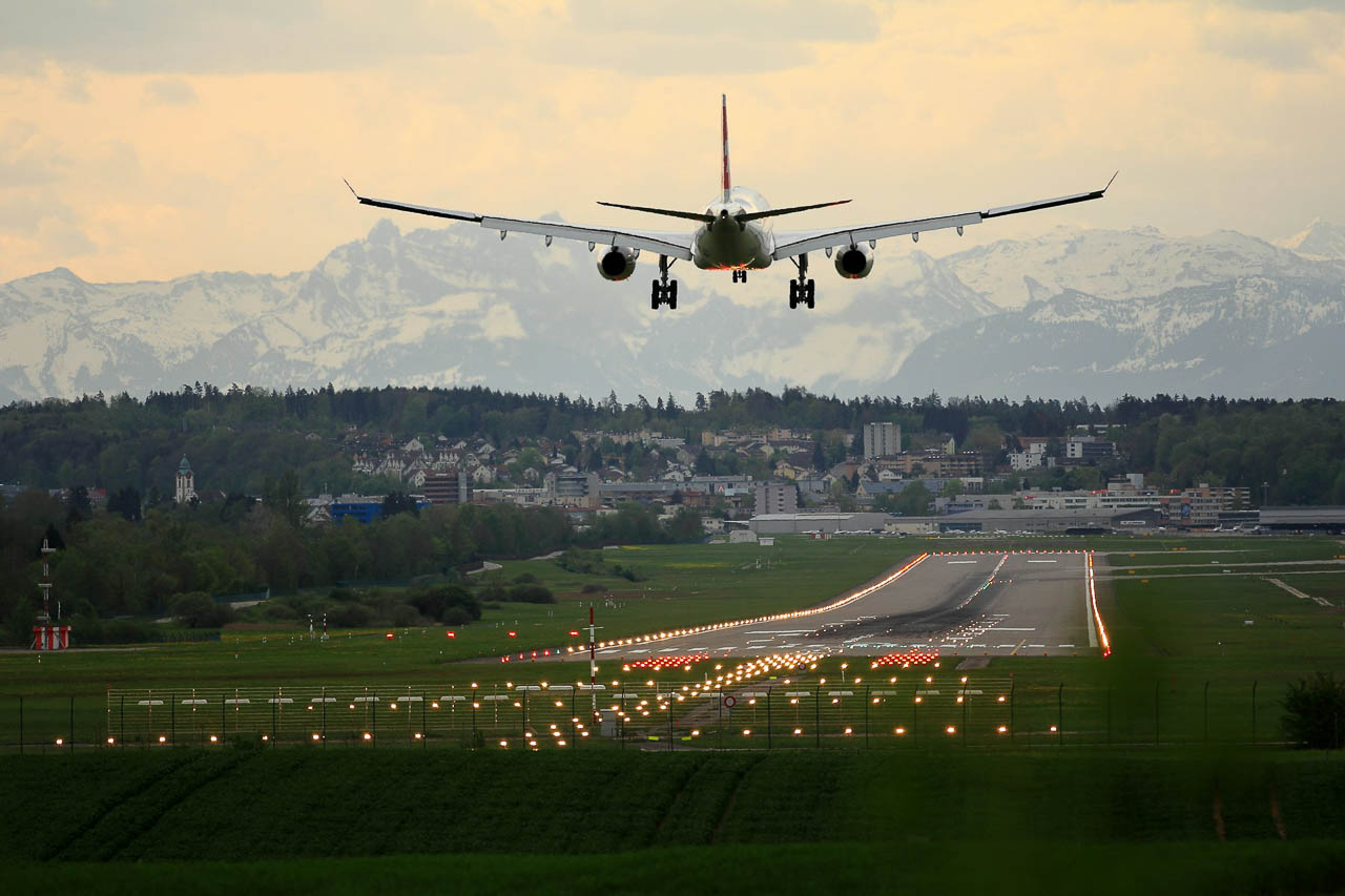 A Swiss plane landing at Zurich Airport