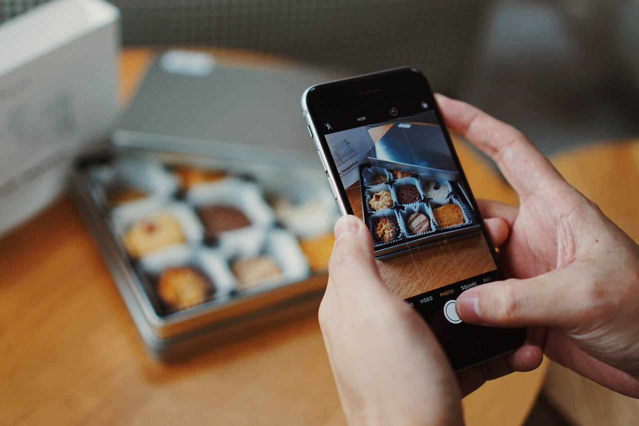 A box of gourmet chocolates shot on an iPhone.