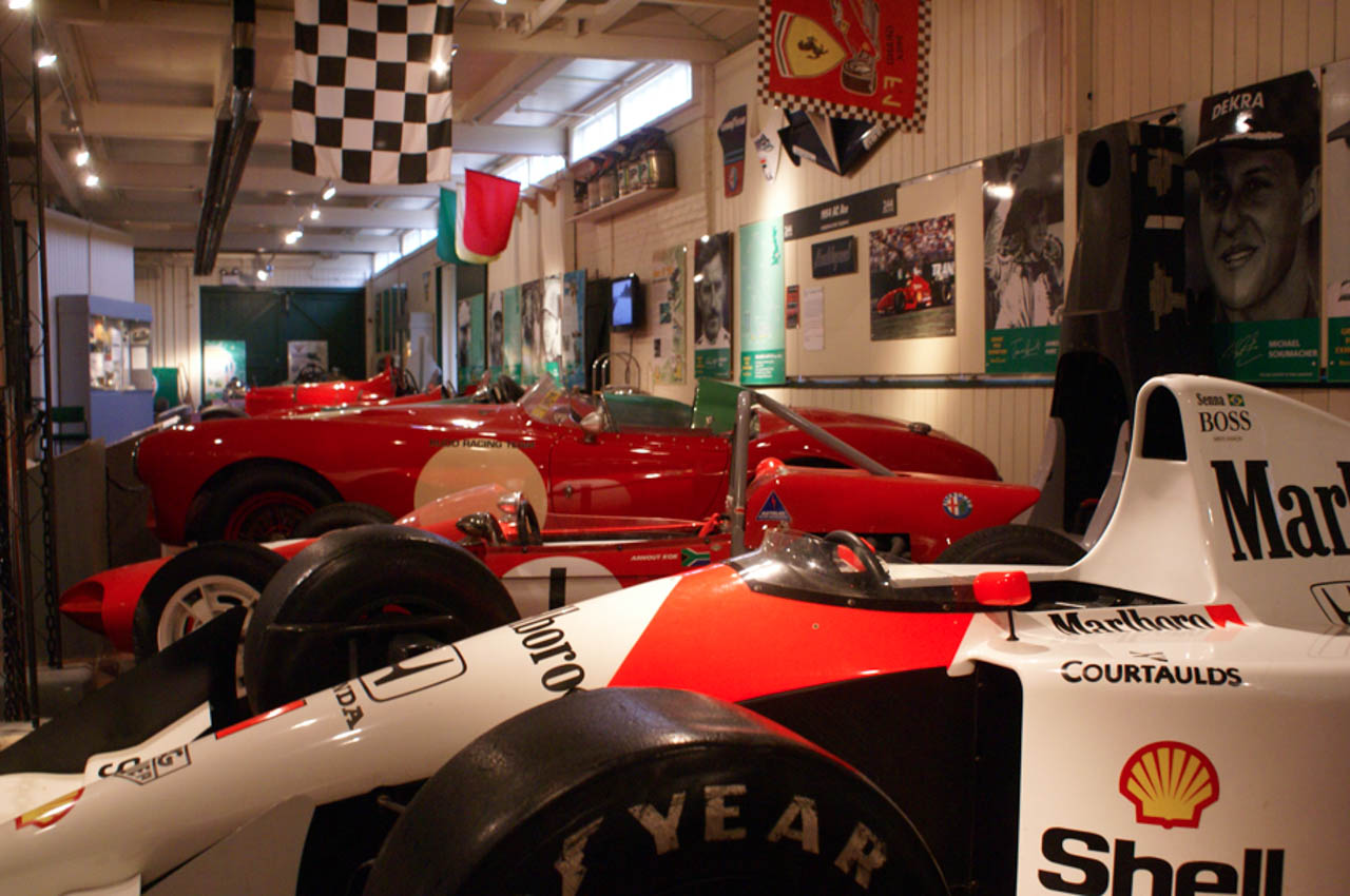 Old vintage cars arranged on display at a motor trade show
