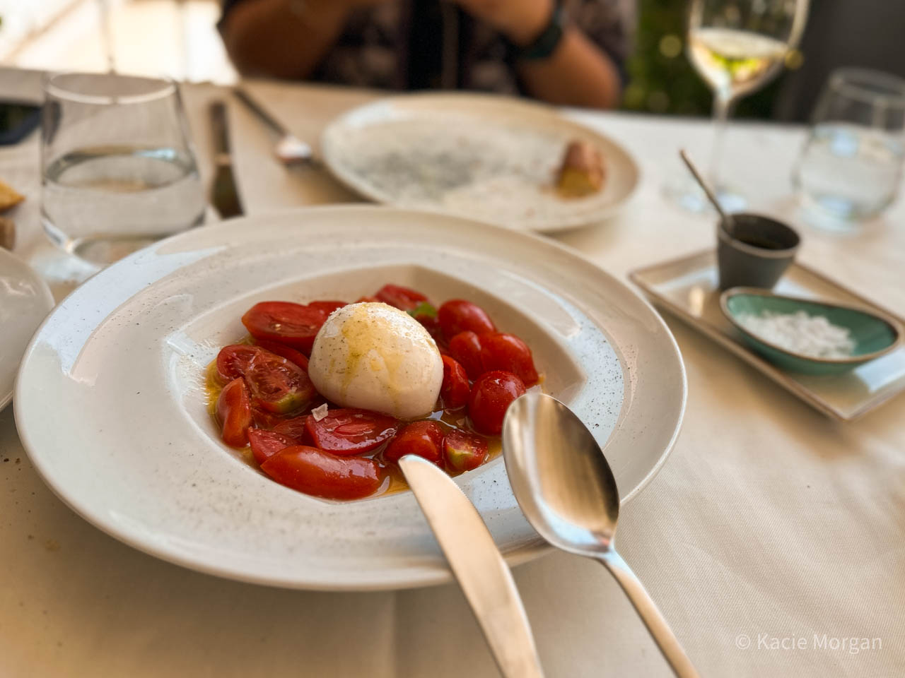 Cherry tomatoes and Greek mozzarella burrata drizzled with extra virgin Greek olive oil