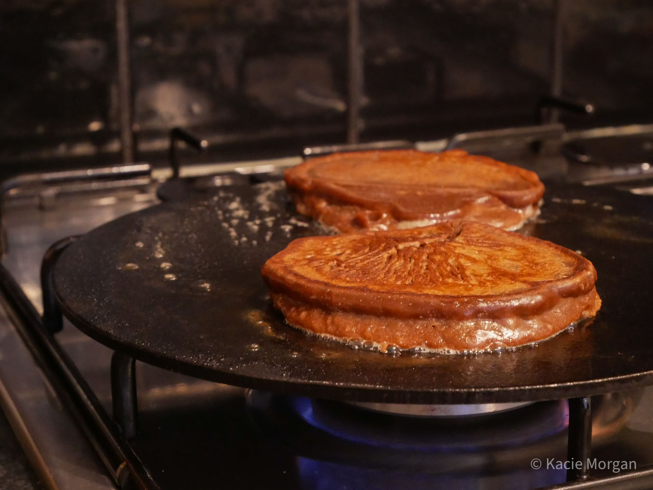 Chocolate protein Welsh pancakes "crempogau" cooking on a bakestone
