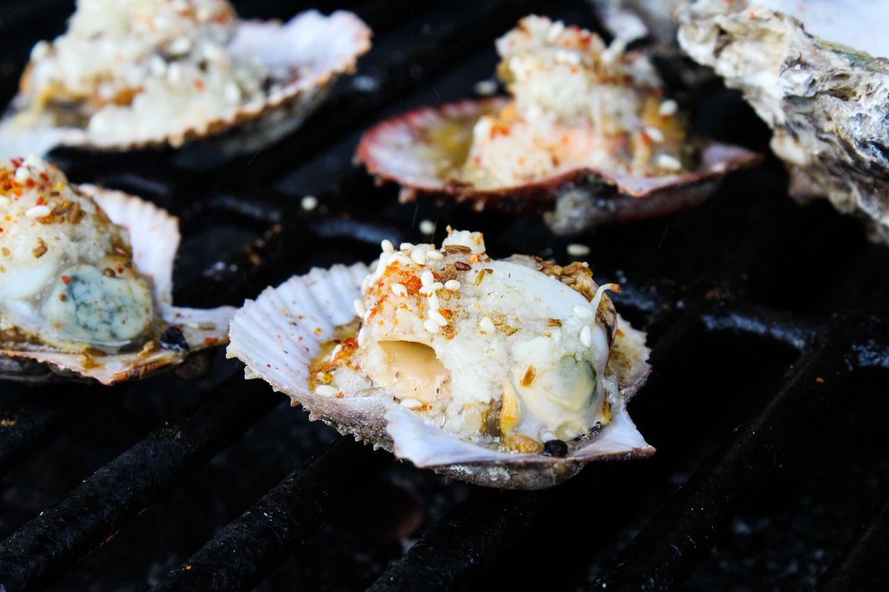 Grilled oysters with toppings