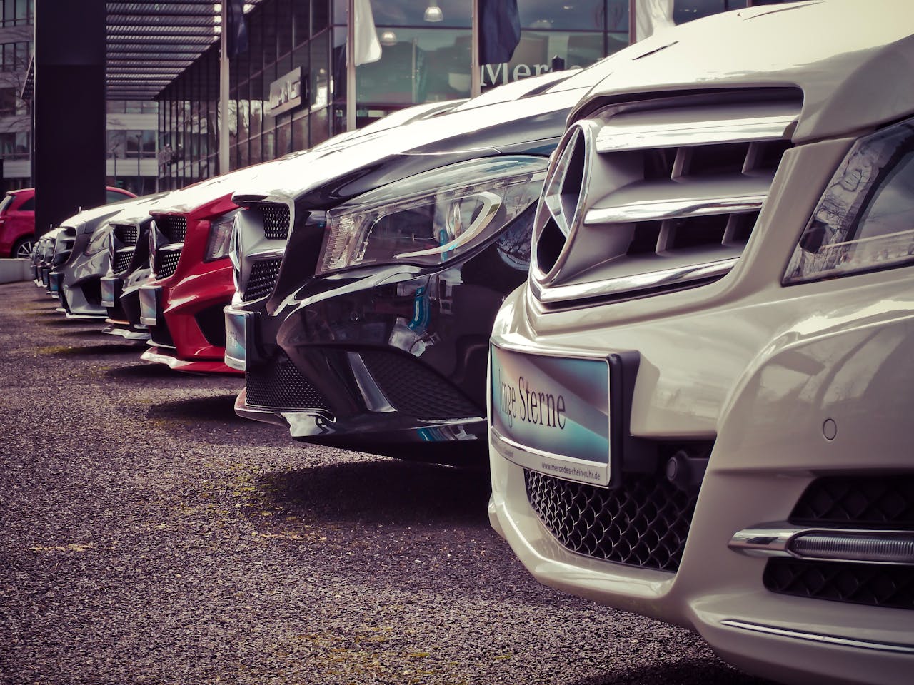 Mercedes Benz cars parked up