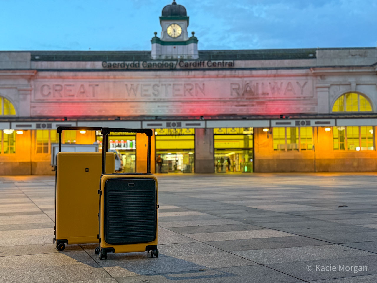 Two LEVEL8 suitcases pictured outside Cardiff Central train station