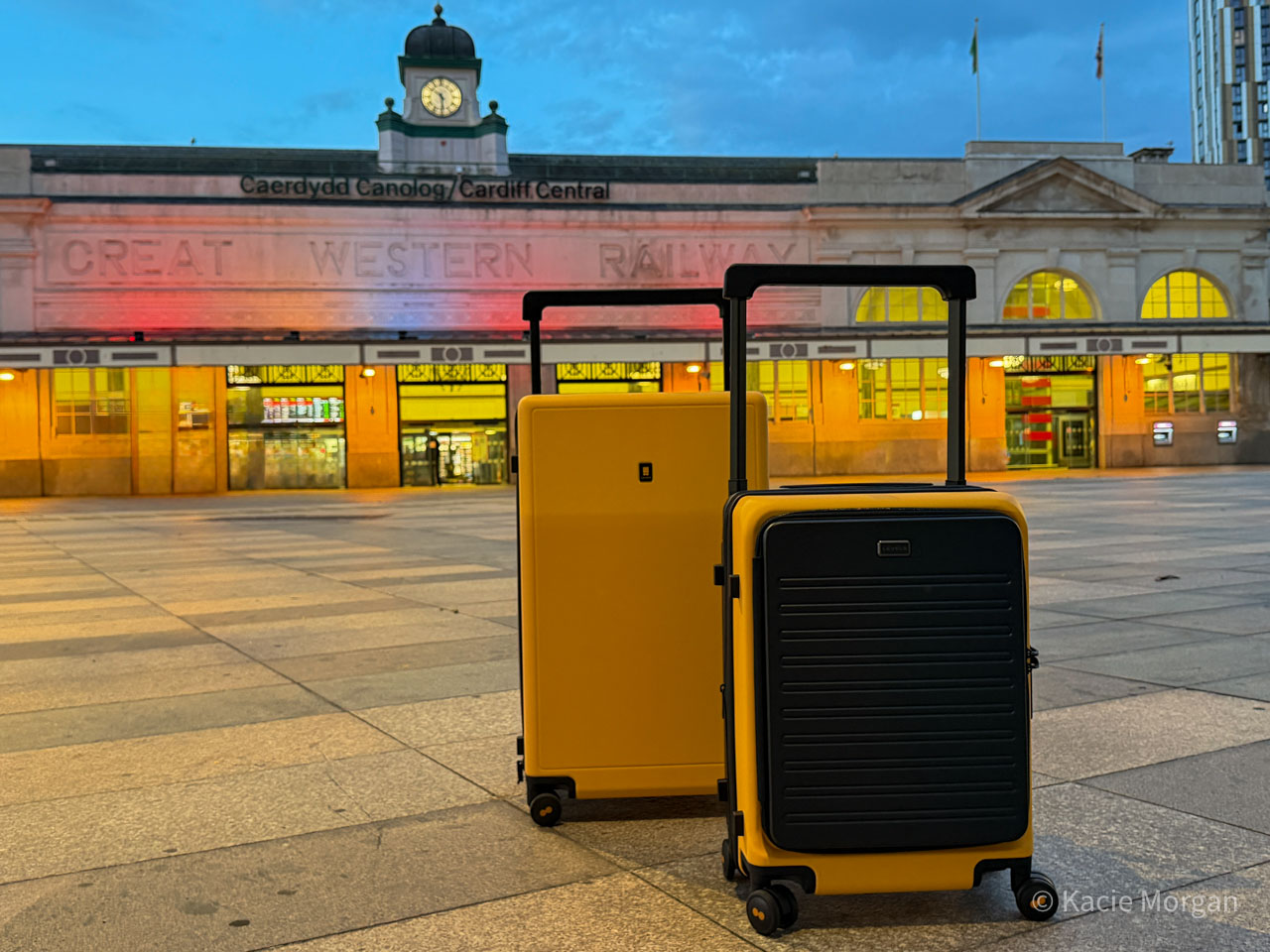 Close-up of two LEVEL8 suitcases photographed outside Cardiff Central station